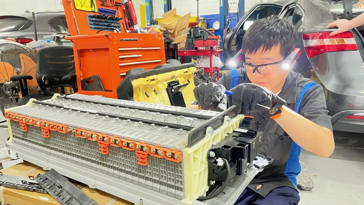 ASE certified technician servicing a hybrid high-voltage battery pack at RepairTech Automotive